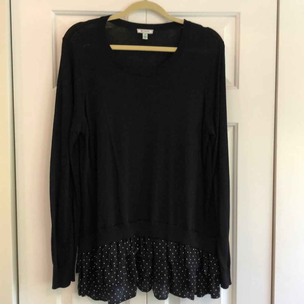 Black top with polka dot flounce